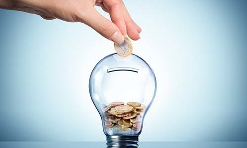 invest to energy concept - euro in bulb - piggybank